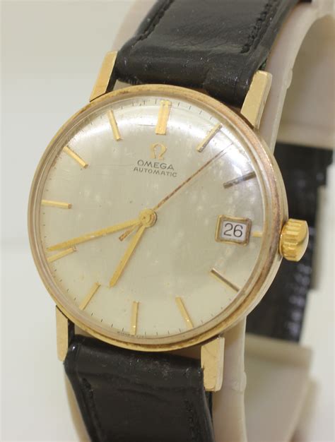 vintage gold omega automatic watch.